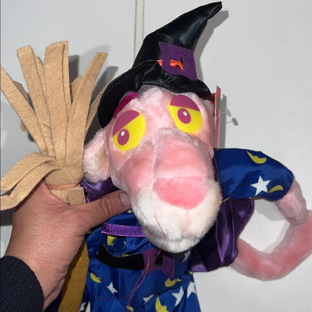 Vintage 1999 Kellytoy Pink Panther Merlin plush toy. 
Wizard with broom